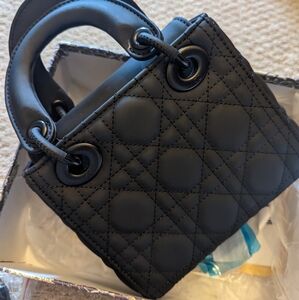 Black shoulder crossbody patterned bag